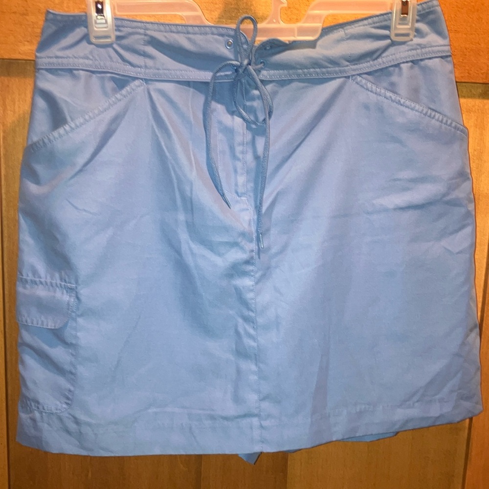 EUC Vintage Izod Women's X-tra Dry Blue Golf Skort w front zip/tie Woman’s 12